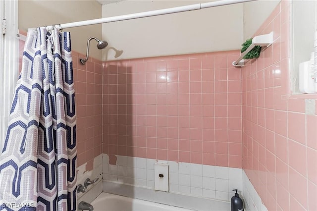 bathroom featuring shower / bath combination with curtain