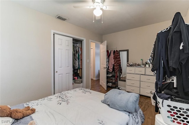 bedroom featuring dark wood-type flooring and ceiling fan