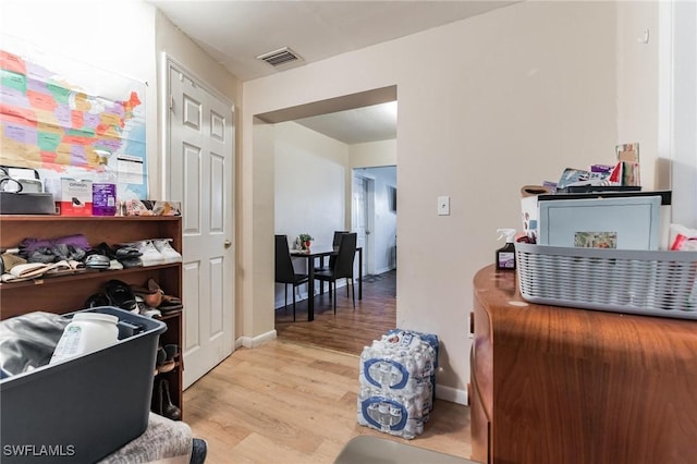 home office with light wood-type flooring