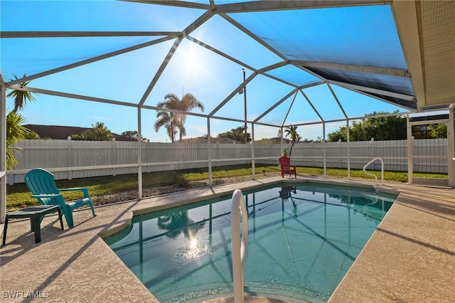 view of pool featuring a patio and a lanai