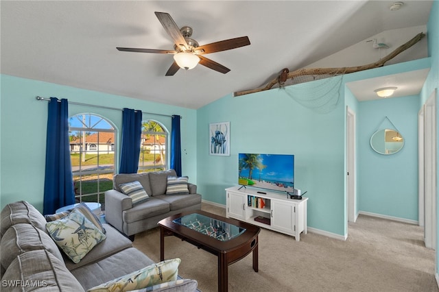 living room featuring lofted ceiling, light colored carpet, and ceiling fan