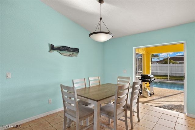 dining room featuring light tile patterned floors