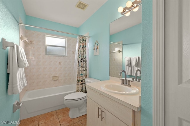 full bathroom with shower / tub combo with curtain, tile patterned floors, toilet, and vanity