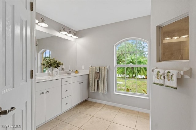 bathroom with vanity and tile patterned floors