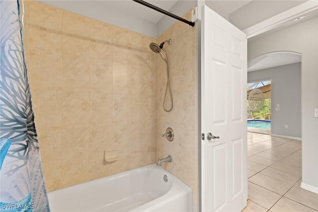 bathroom featuring shower / tub combo and tile patterned flooring