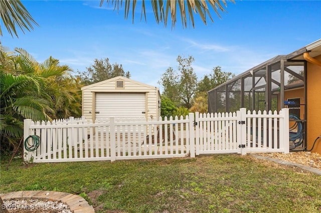 view of yard featuring a storage shed and a lanai