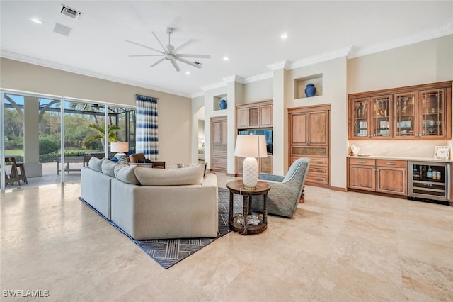 living room featuring wine cooler, ceiling fan, and ornamental molding