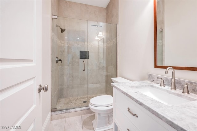 bathroom featuring walk in shower, vanity, and toilet