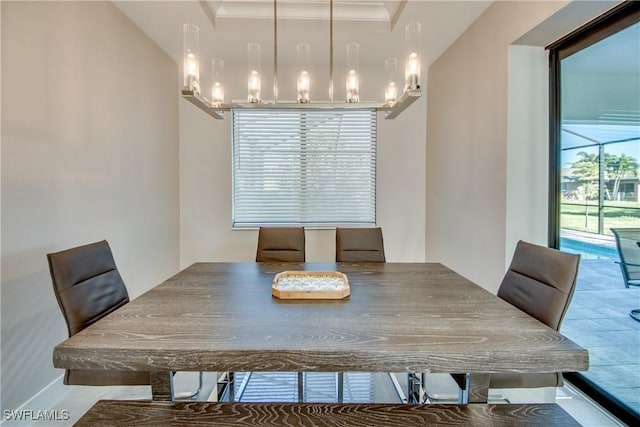 unfurnished dining area with crown molding