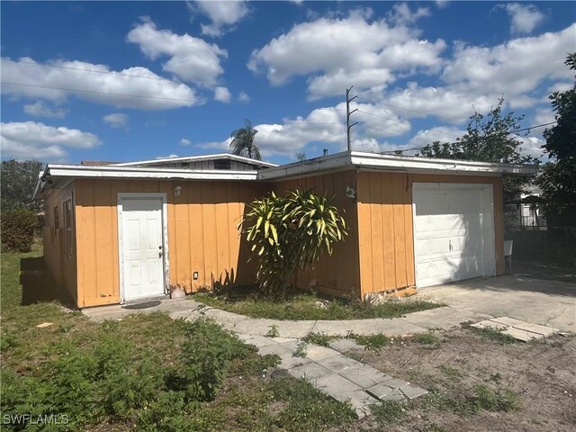 view of outbuilding with a garage