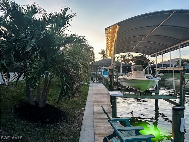 dock area featuring a water view