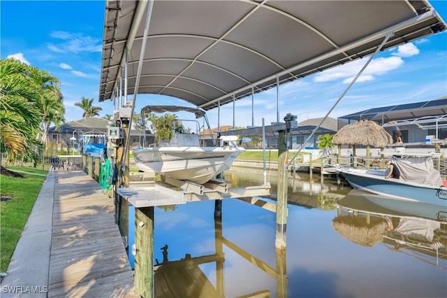 dock area featuring a water view