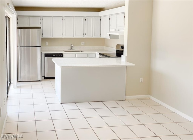 kitchen with sink, light tile patterned floors, stainless steel appliances, and kitchen peninsula