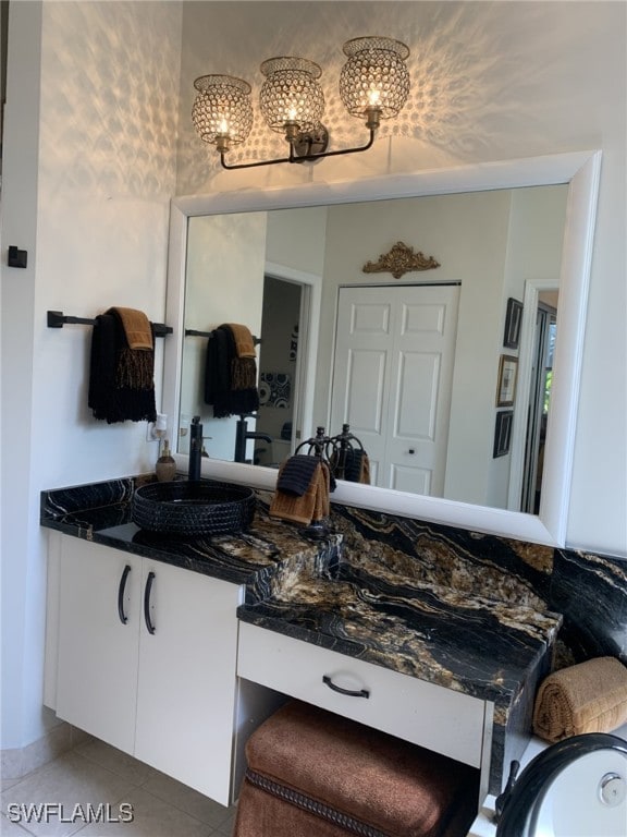 bathroom featuring tile patterned floors and vanity