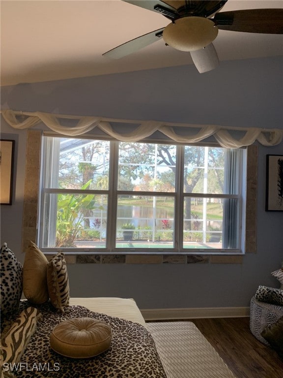 sitting room featuring hardwood / wood-style flooring, ceiling fan, and plenty of natural light