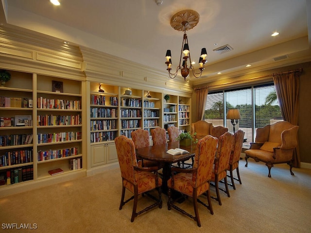 dining room featuring light carpet and a notable chandelier