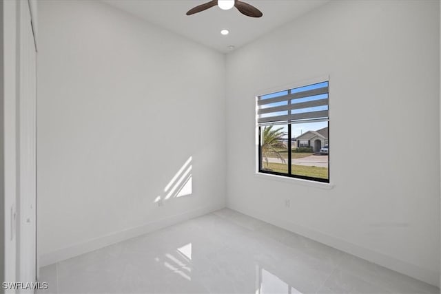 unfurnished room featuring ceiling fan