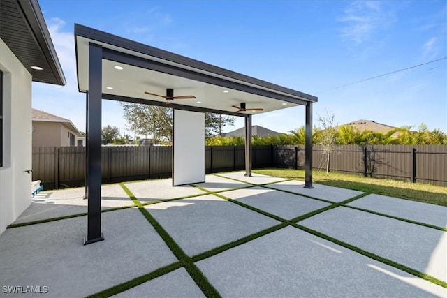 view of patio with ceiling fan