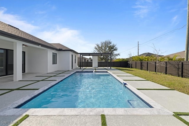 view of pool featuring a patio area and a lawn