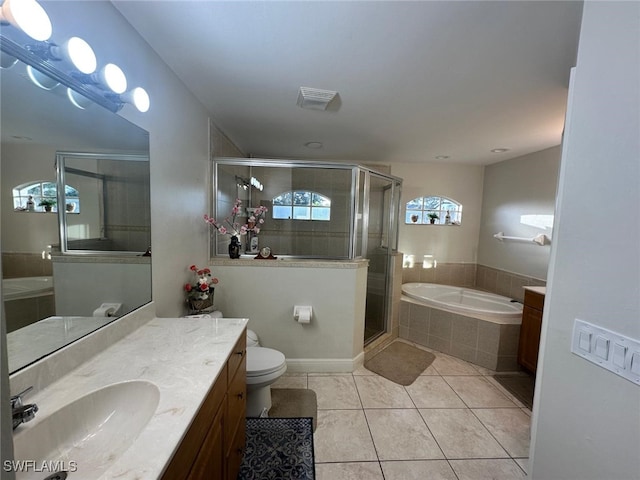 full bath with tile patterned flooring, visible vents, a stall shower, a bath, and vanity