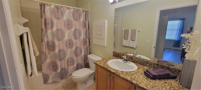 bathroom with toilet, shower / bathtub combination with curtain, tile patterned flooring, and vanity