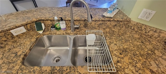 details with stone counters and sink