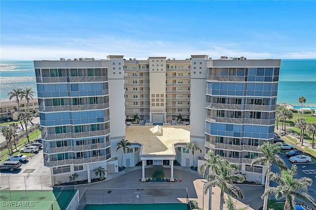 view of building exterior featuring a water view