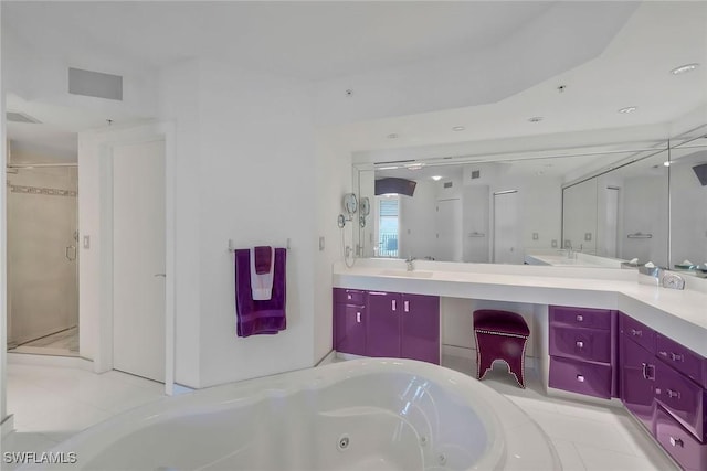 bathroom featuring vanity and separate shower and tub