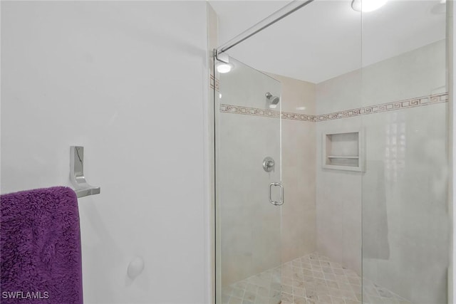 bathroom featuring walk in shower