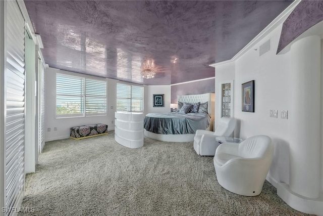 carpeted bedroom with ornamental molding