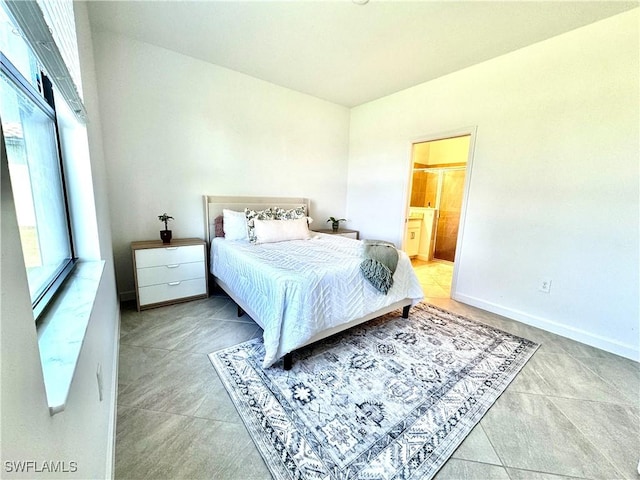 bedroom featuring ensuite bathroom