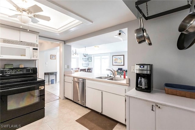 kitchen with light tile patterned floors, sink, dishwasher, white cabinetry, and black range with electric cooktop