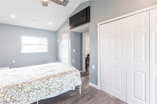 bedroom featuring lofted ceiling, hardwood / wood-style flooring, and ceiling fan