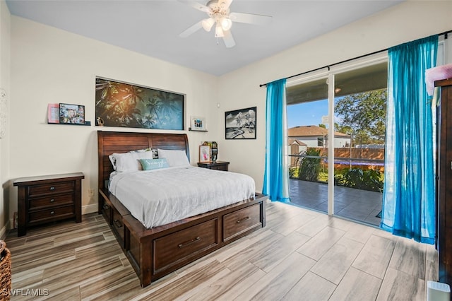 bedroom with access to exterior and ceiling fan