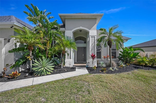 view of front of property with a front lawn