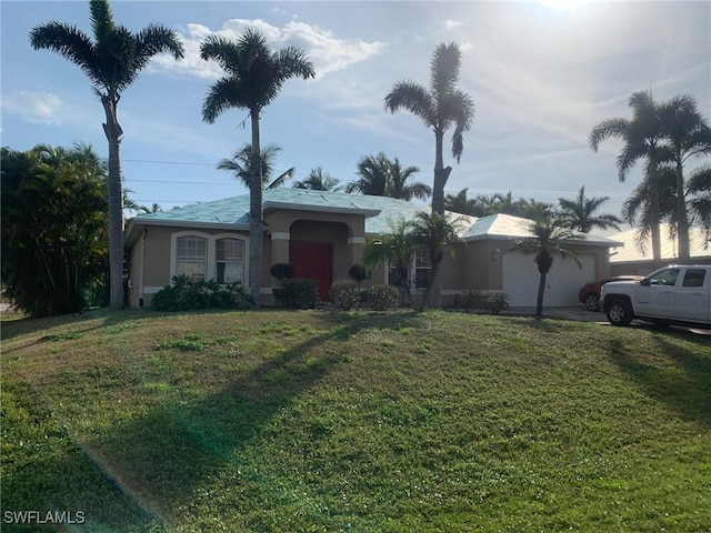 ranch-style home with a front lawn