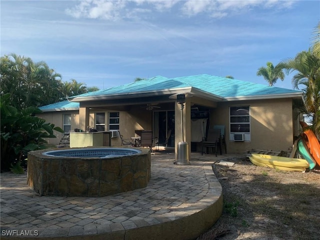 back of property featuring cooling unit, a patio, ceiling fan, and area for grilling