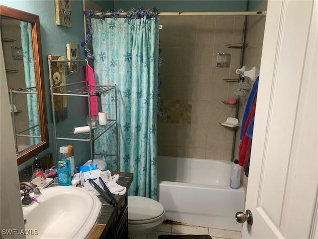 full bathroom featuring tile patterned floors, vanity, toilet, and shower / tub combo