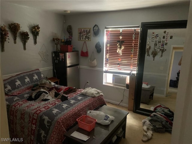 carpeted bedroom featuring stainless steel refrigerator and cooling unit