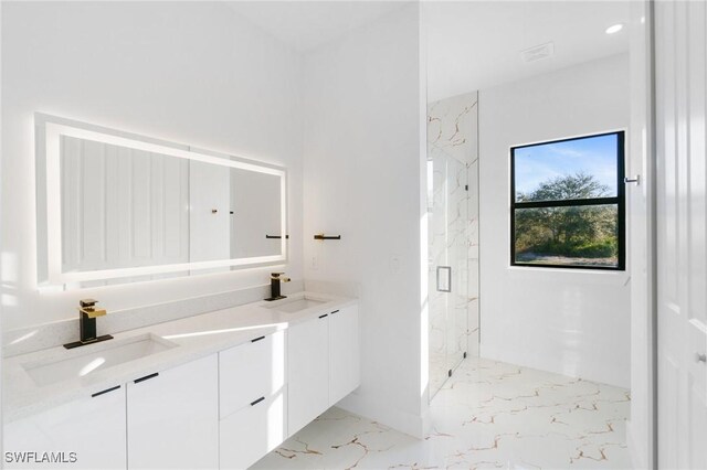 bathroom with vanity and an enclosed shower