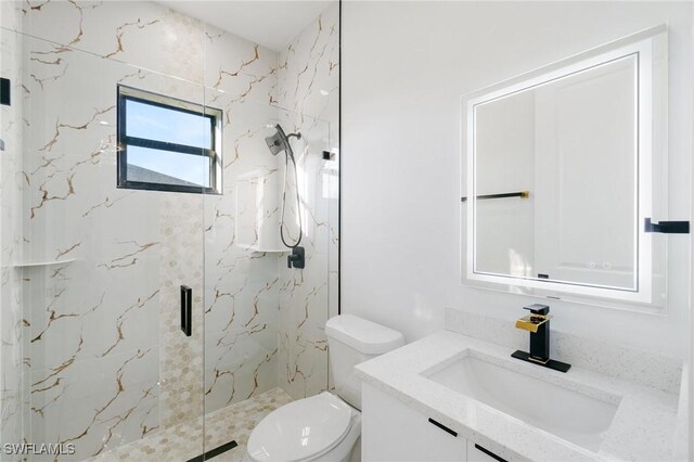 bathroom featuring walk in shower, vanity, and toilet