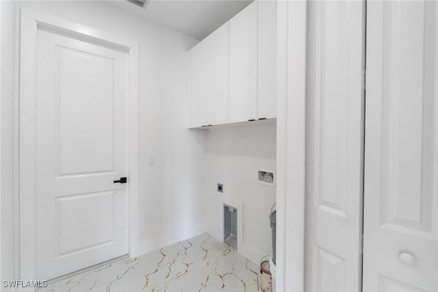 washroom with cabinets, hookup for a washing machine, and electric dryer hookup