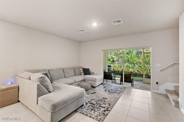 living room featuring light tile patterned flooring