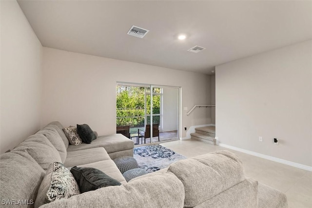 living room with light tile patterned floors