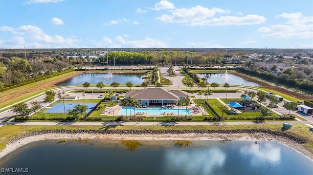 drone / aerial view with a water view