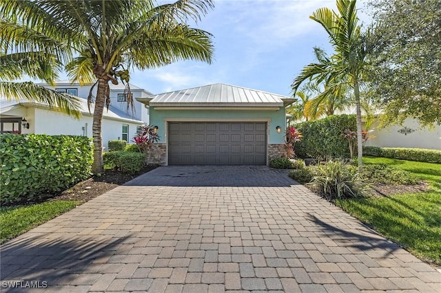 view of front of home with a garage