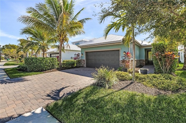 view of front of property with a garage