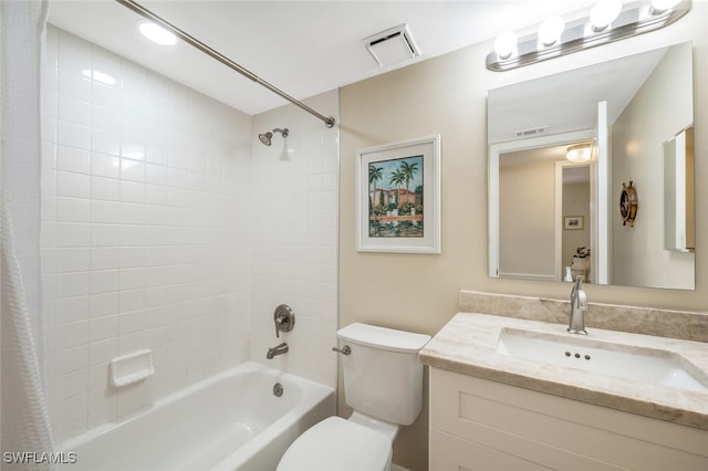 full bathroom featuring shower / bath combo, vanity, and toilet