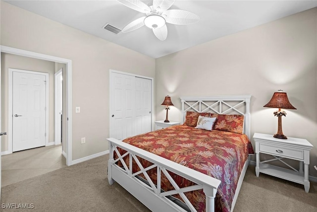 bedroom with carpet flooring, ceiling fan, and a closet