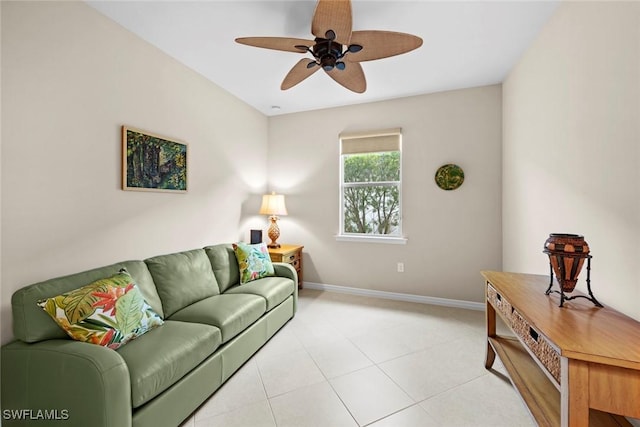 tiled living room with ceiling fan